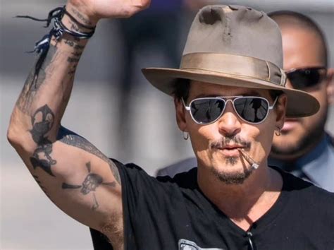 crossbones tattoo|Tattoo Johnny .